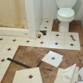 Re-tiling bathroom floor